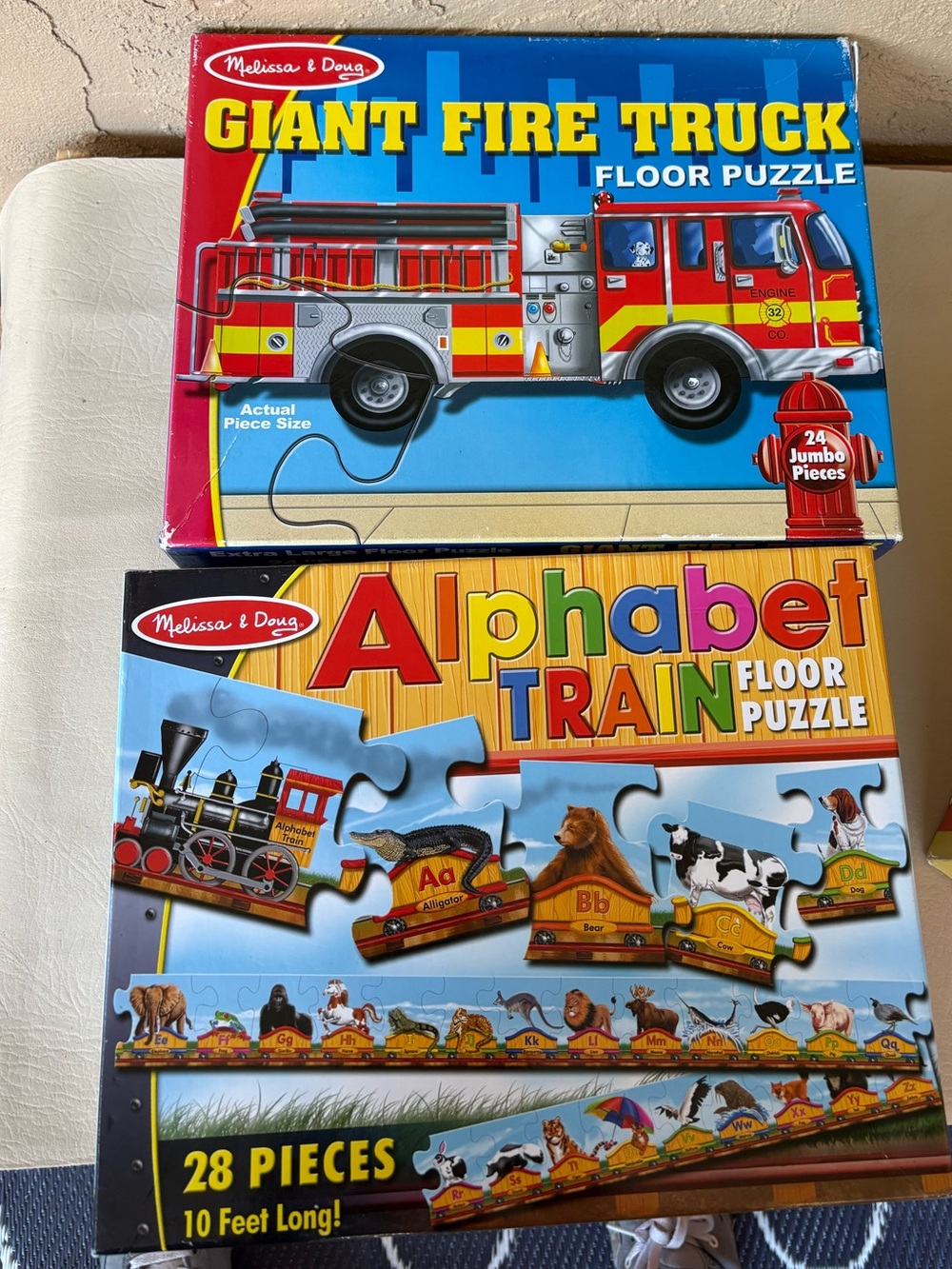 2- Melissa and Doug Giants fire truck & Alphabet Train puzzles